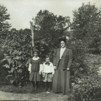 Marshall-Schmidt Album: Mother with Son & Daughter in Garden