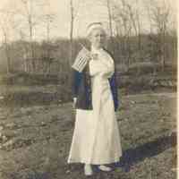 Bosworth: Bessie Bosworth with photo of Guy Bosworth and Flag