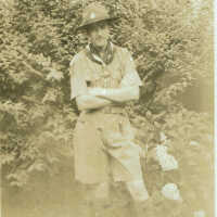 Scouts: Millburn Boy Scout Standing in Front of House, c. 1922