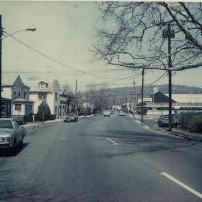 Main Street: Bar, Residences on Main Street, Exxon and Staff Good Deal Supermarket on Main Street across from 149 Main Street (Subject Property)