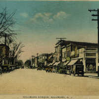          Color postcard, unused; View of Millburn Avenue c. 1928 shows two-way traffic.
   