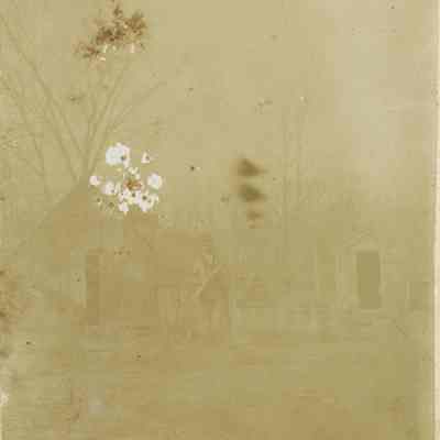 Gallitelli: Man holding a rifle standing at 9 Orchard Street, Millburn