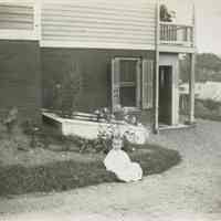 Marshall-Schmidt Album: Baby Seated Outside a House