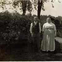 Marshall-Schmidt Album: Elderly Man and Woman Standing Near Horse-Drawn Carriage