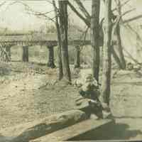 Railroad Trestle over West Branch of Rahway River, with Child Seated Outside, c. 1906