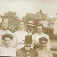          Marshall-Schmidt Album: Family with Neighborhood Houses Behind picture number 1
   