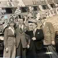 Dunn: Bob Dunn and United Airlines Plane decorated with cartoons, 1949