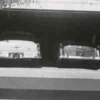          Garage at 919 Ridgewood Road showing morning glories, 1953 Chrysler & 1953 Ford
   