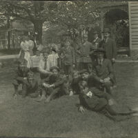 Marshall-Schmidt Album: Boys Formally Dressed Outside Near Picnic Table