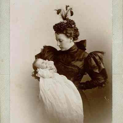 Kellogg: Fashionable Woman (Unidentified) Holding a Baby, c. 1890s