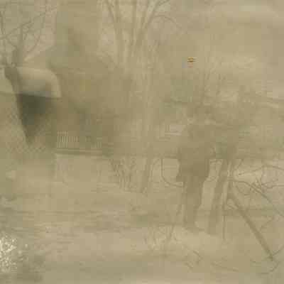 Marshall-Schmidt Album: Man Standing in Backyard in the Snow