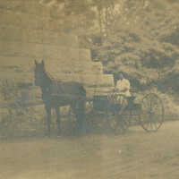 Woman in Horse & Carriage Near Stone Arch on Morris Turnpike