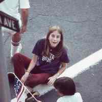          Lauren P. Lampe wearing a Futter Brothers (Futter Brothers Shoe Store) T-Shirt at the Corner of Millburn and Main.
   