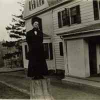 Marshall-Schmidt Album: Young Woman Standing on a Stump