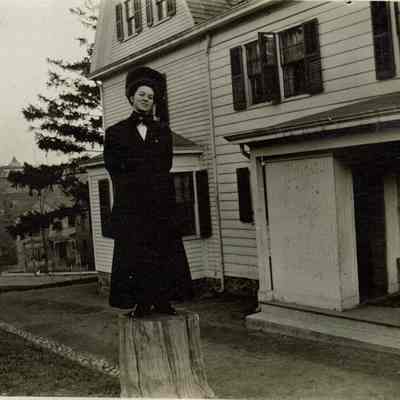 Marshall-Schmidt Album: Young Woman Standing on a Stump