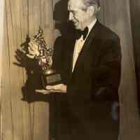 Dunn: Bob Dunn with Ruben Award, 1975