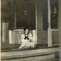          Marshall-Schmidt Album: Young Girl Seated on Porch picture number 1
   