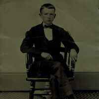 Photograph: Boy Seated, undated