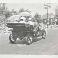 Centennial Parade: People in an Antique Car, 1957