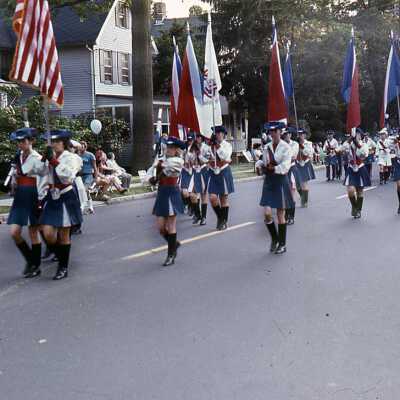 July 4: Bicentennial Parade-Female marchers in Red, White, Blue Costume