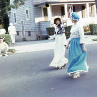 July 4: Two female marchers in Colonial Costume in American Bicentennial Parade, 1976