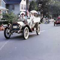 July 4: Unidentified Women in Costume in Antique Car in American Bicentennial Parade, 1976