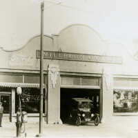 Millburn Garage with Gas Pump & Ford Exiting, 1911/2