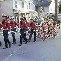 July 4: Old fashioned Fire Hose in American Bicentennial Parade, 1976