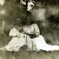 Two Women Seated in the Grass, c. 1906