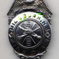 Millburn Fire Dept pin back badge # 11