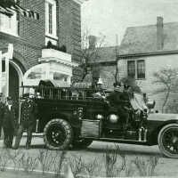 Fire Department: Firemen and Small Ladder Truck at Fire Station/Town Hall