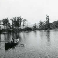 Hartshorn: Stewart Hartshorn Rowing On Squam Lake, New Hampshire