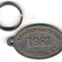 Abraham and Strauss metal charge plate