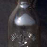 Millburn Pharmacy Stoppered Glass Bottle