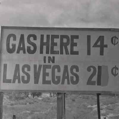 Las Vegas- sign advertising cheaper gasoline outside Las Vegas, ca. 1929-1930