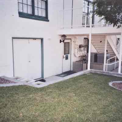 Boulder Dam Hotel exterior: delivery bay, Boulder City Museum and Historical Association