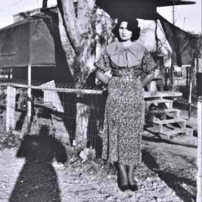 Burt family posed at their home-made trailer house