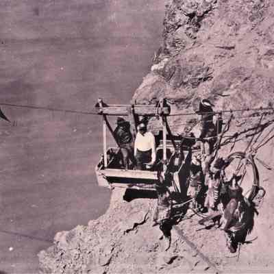 Boulder Canyon- Nevada Governor James Scrugham with Moapa Paiute Indians in costume at the USBR gauging station, 1925