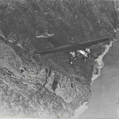 Ford Tri-motor airplane over Black Canyon, ca. 1930