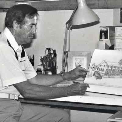 artist Ted Goodwin with his depiction of the Boulder Dam Hotel, 1980s