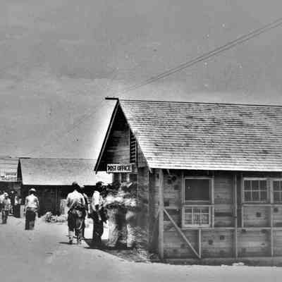 Six Companies temporary camp post office, commissary, barber shop 1931