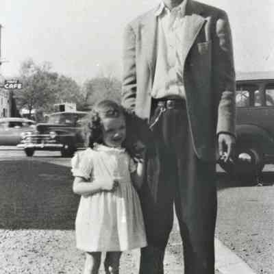 Harry Won with Cathy on the east side of the Boulder Dam Hotel, 1948