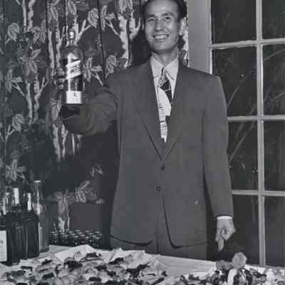 Harry Won catering a party in the Boulder Dam Hotel dining room, 1948