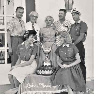 l-r: Bob Glinski; Elton Garrett; Jackie Brown & Hal Brown Boulder Dam Hotel owners; Dan Steelman Commodore of the Lake Mead Yacht Club front, l-r: Ann Underhill; Robin Killinger Queen of the 53rd Annual Gold Cup Race, Lake Mead. 1960