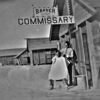 Six Companies temporary camp barber shop and commissary, 1931