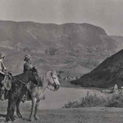 Alta Ham and co-star in the vicinity of Black Canyon during filming of the motion picture "Water", c. 1928-1929