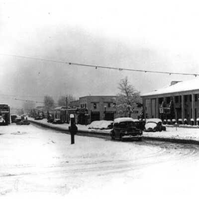 Arizona St. Streetscape snow Boulder Dam Hotel right, 1948