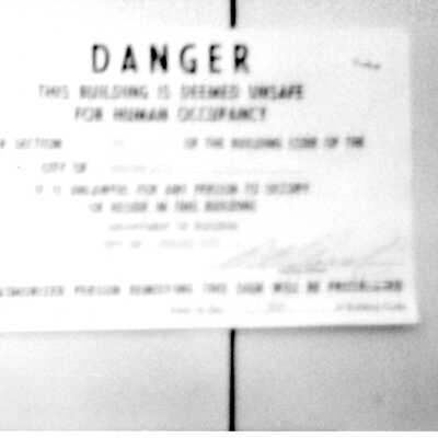 Boulder Dam Hotel July 1983 storm damage repairs - danger sign