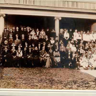 Group photograph of Ward-Belmont Preparatory school, undated: Students and teachers posed together outside of a building, undated photograph