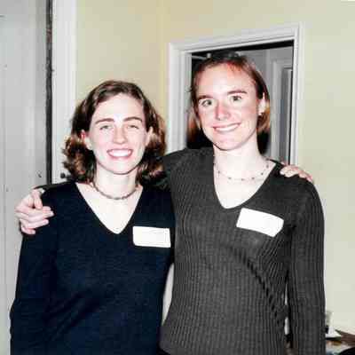 Courtney Pace and unknown student pose for a picture